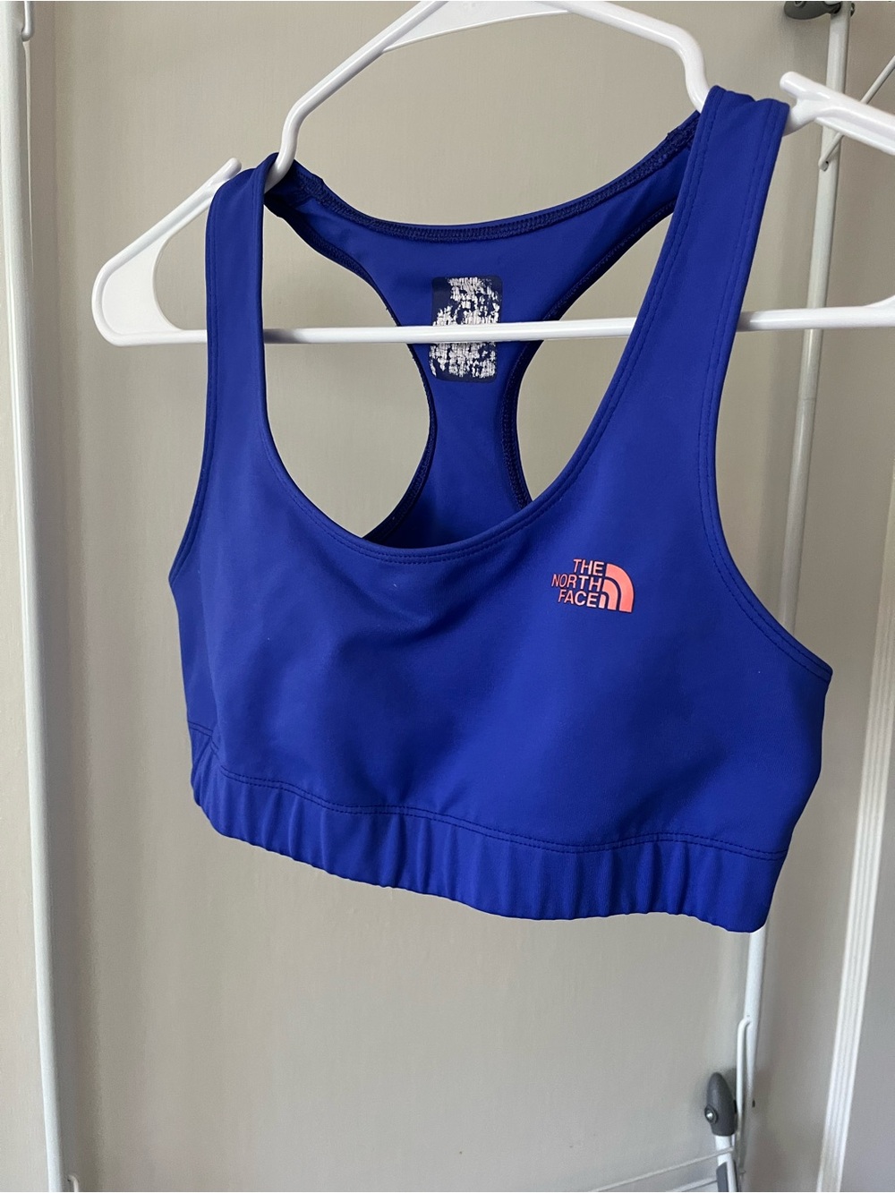 The North Face Royal Blue Racerback Sports Bra with Coral Logo